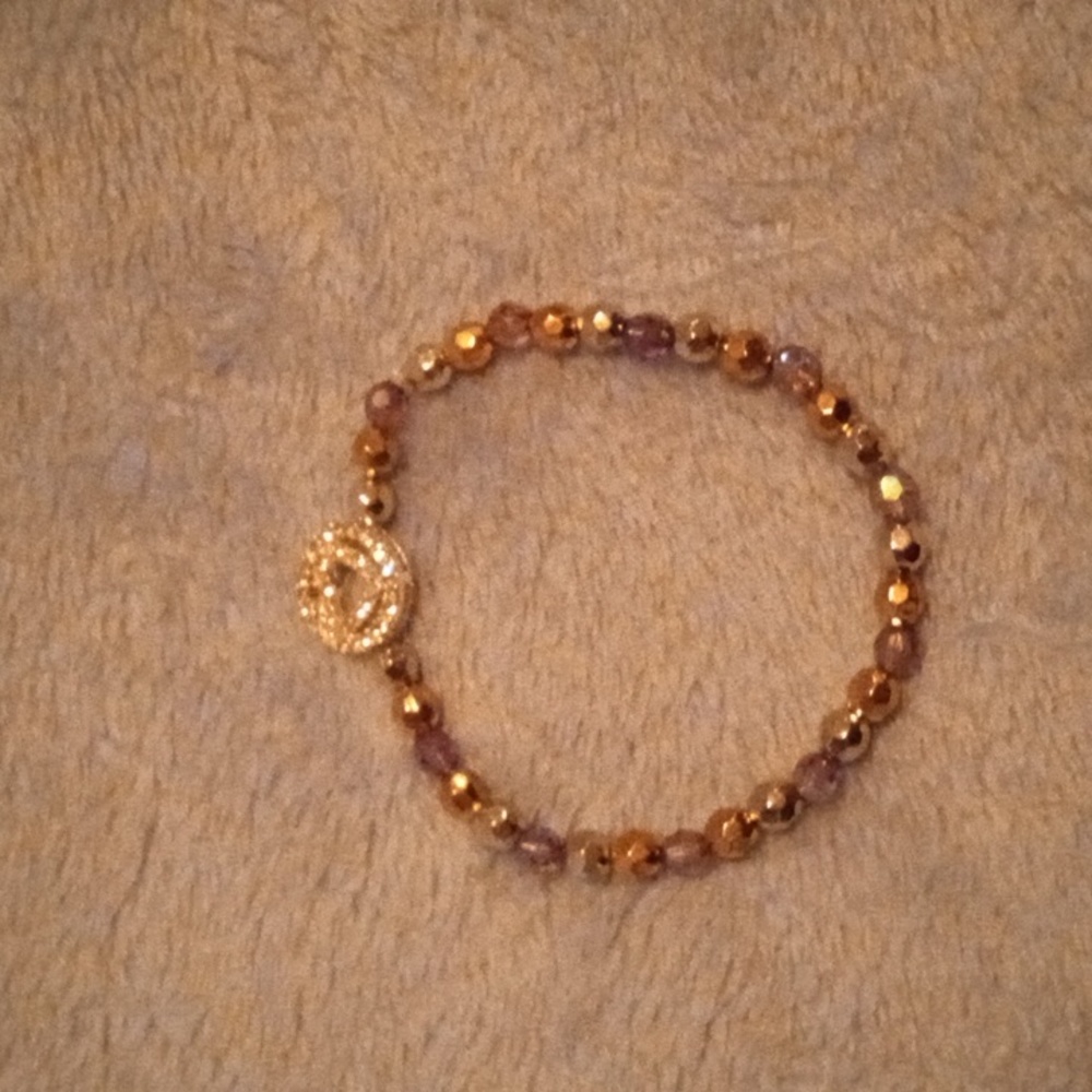 Handmade casual multicolored bracelet with beautiful sparkly heart charm